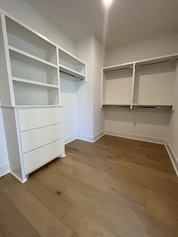 a view of an empty room with empty racks