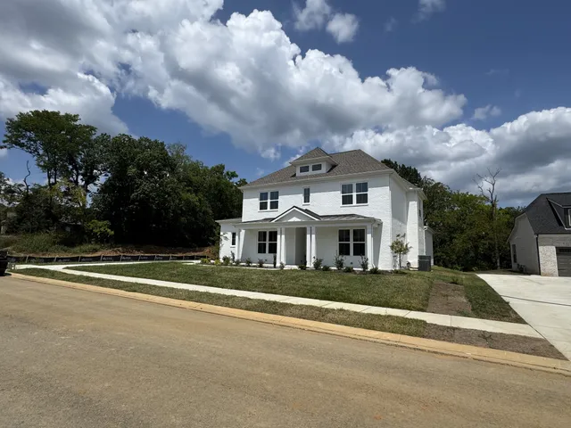 front view of house with a garden