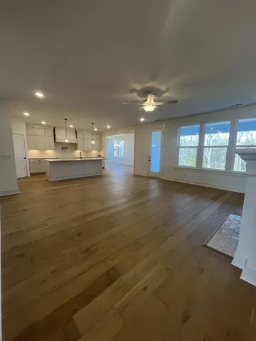 a view of a kitchen and a window