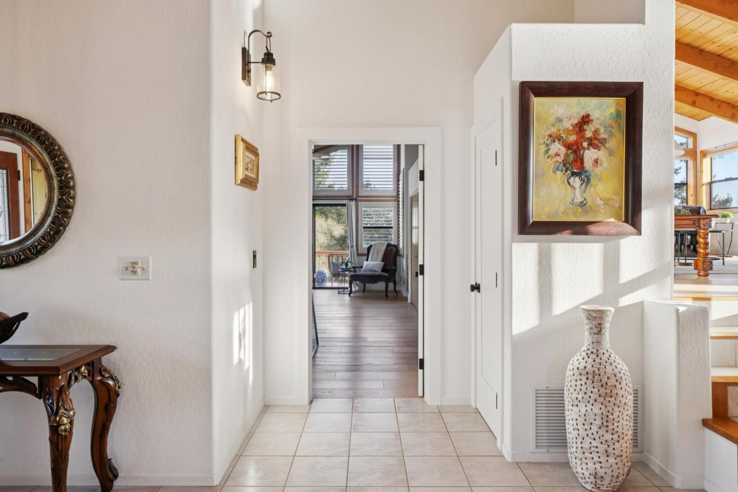 600 Ridge Top Road Los Gatos, CA 95033 - Photo 29 of 81 a view of a hallway with a view of bedroom with furniture and entryway