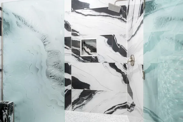 a bathroom with a sink toilet and mirror