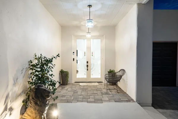 a living room with a couch and a flat screen tv