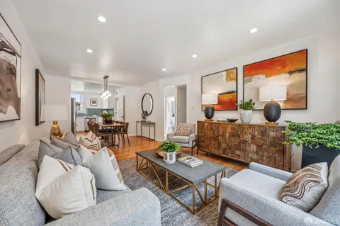 a kitchen with stainless steel appliances granite countertop a refrigerator sink and cabinets