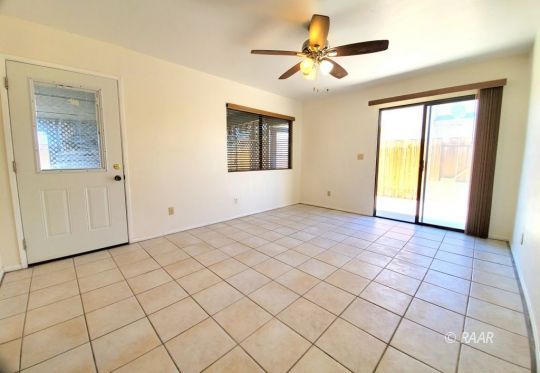 419 South Lorie Ann Street Ridgecrest, CA 93555 - Photo 8 of 27 a view of an empty room and a window