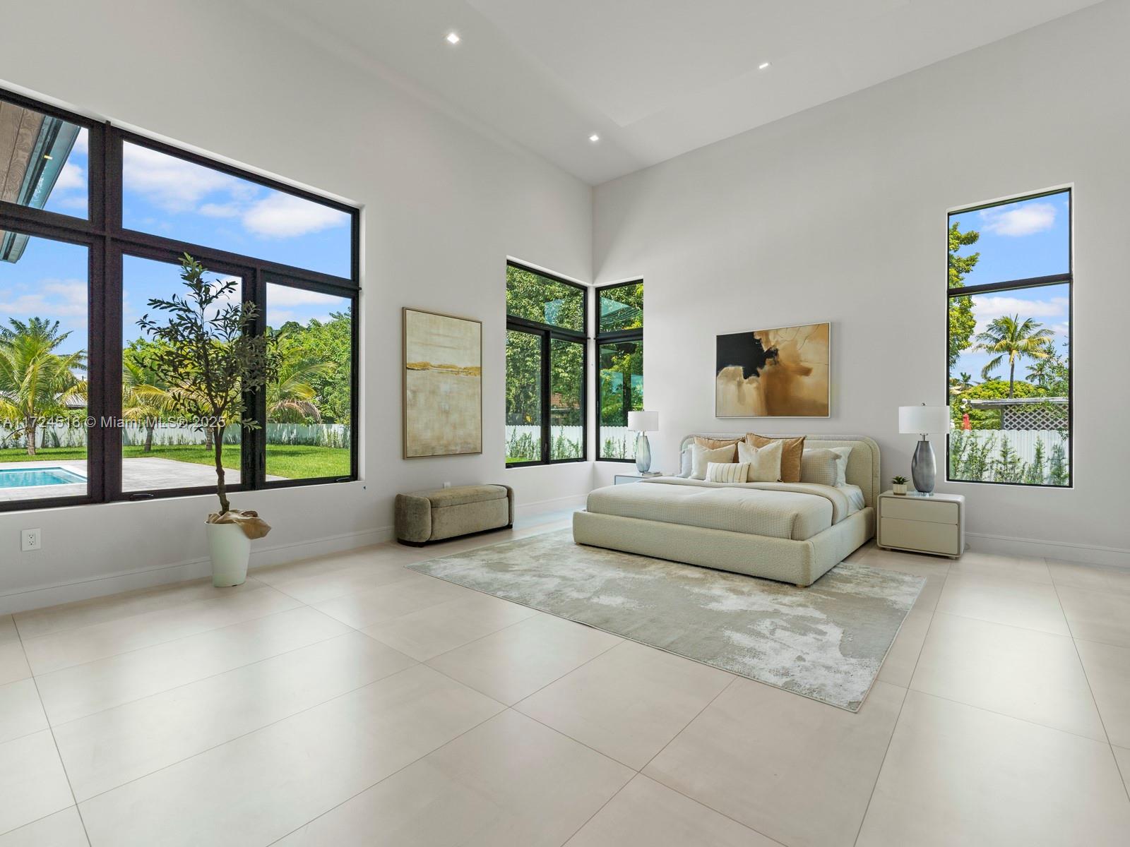 12025 Southwest 46th Street Miami, FL 33175 - Photo 12 of 45 a living room with furniture and a large window