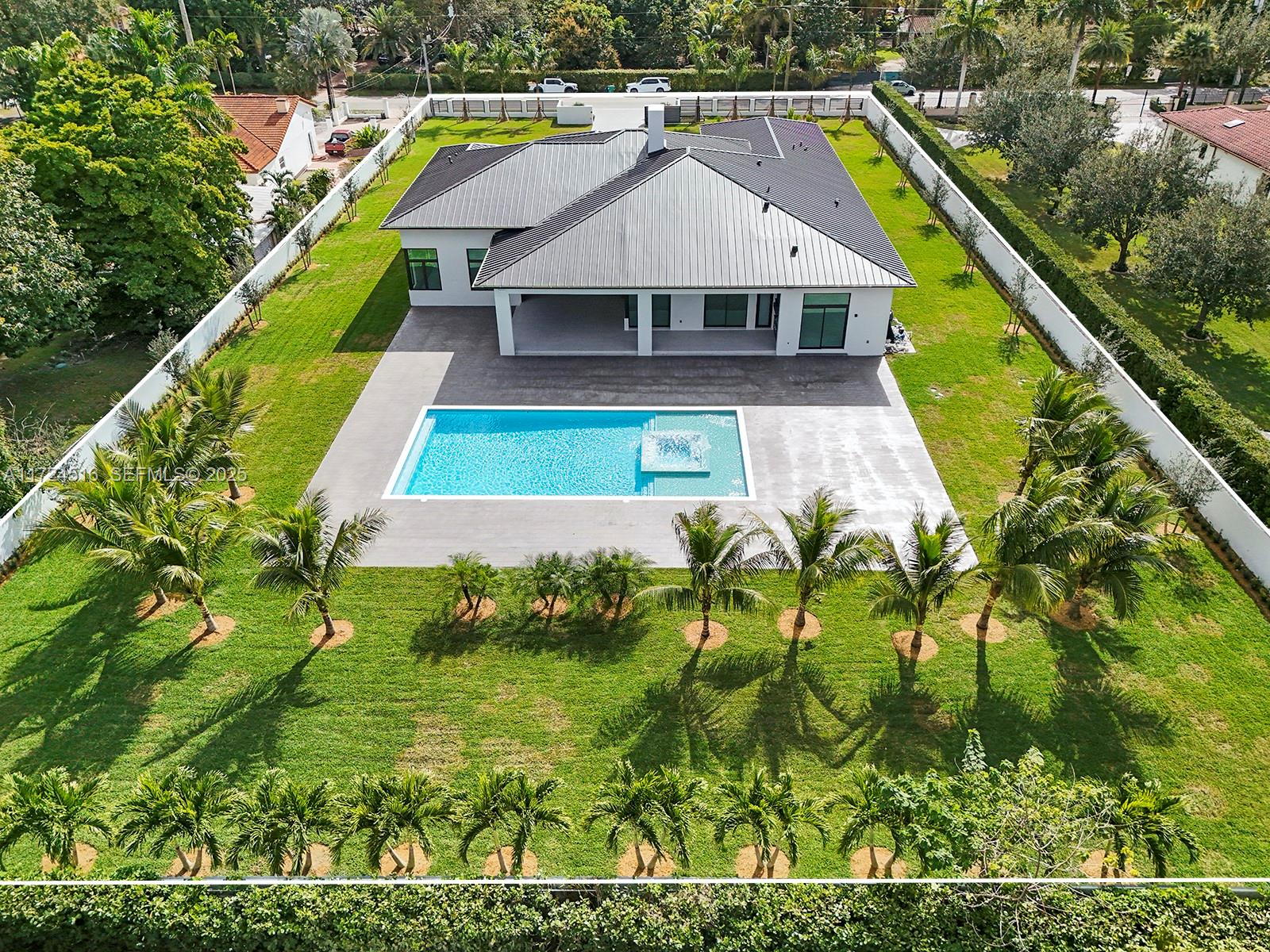 12025 Southwest 46th Street Miami, FL 33175 - Photo 35 of 45 an aerial view of house with a yard