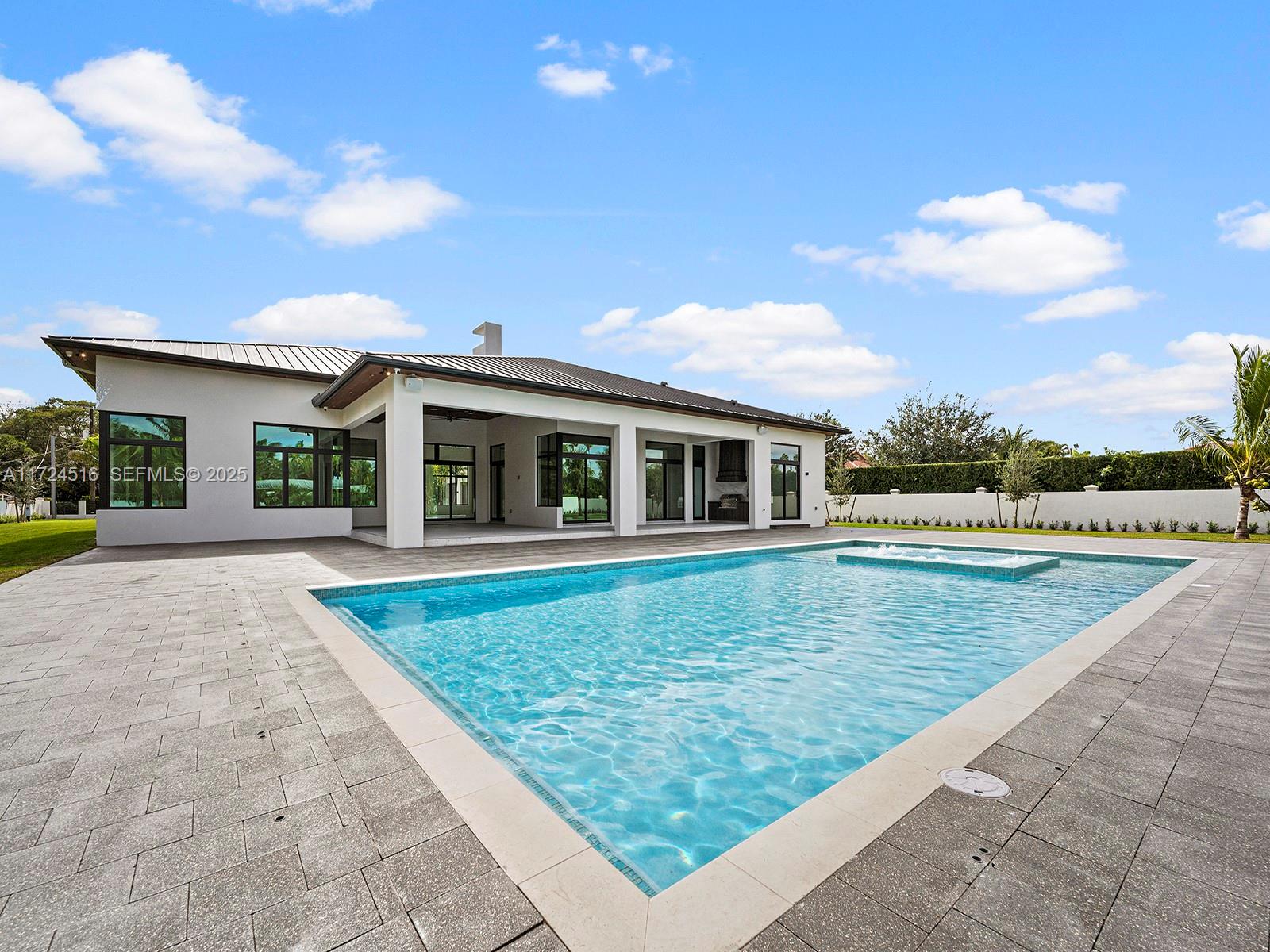 12025 Southwest 46th Street Miami, FL 33175 - Photo 36 of 45 a view of pool with outdoor seating