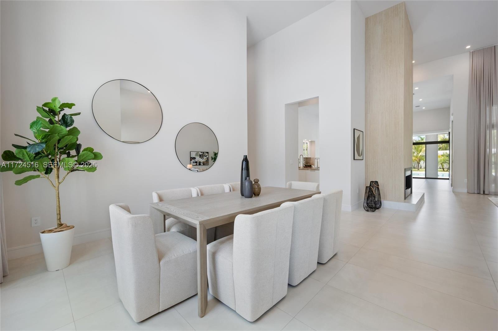 12025 Southwest 46th Street Miami, FL 33175 - Photo 6 of 45 a very nice looking room with a table and chairs