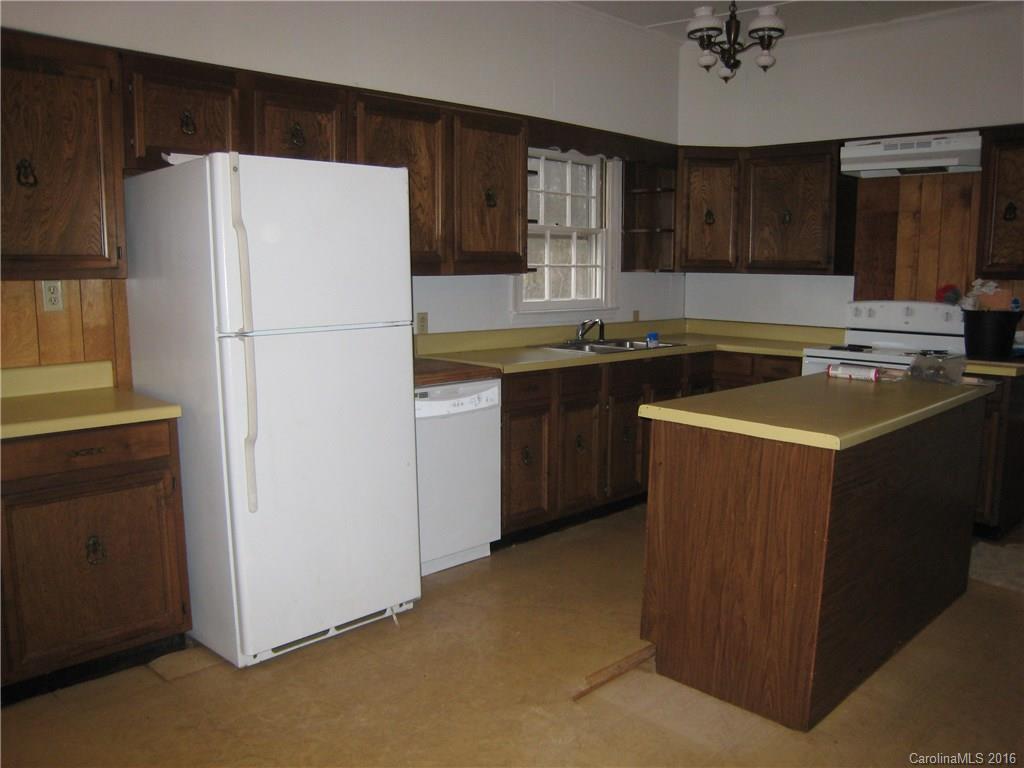 153 State Rd S-29-412 Fort Mill, SC 29707 - Photo 3 of 10 a kitchen with a refrigerator sink and cabinets