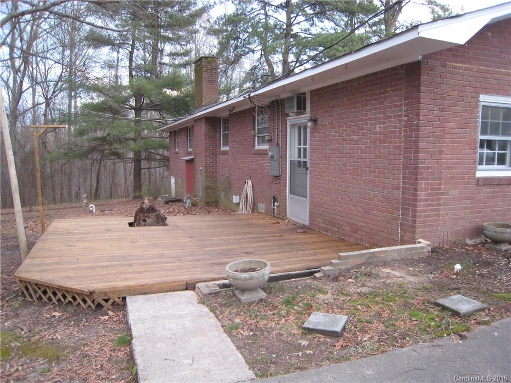 153 State Rd S-29-412 Fort Mill, SC 29707 - Photo 4 of 10 a view of a backyard with plants and trees