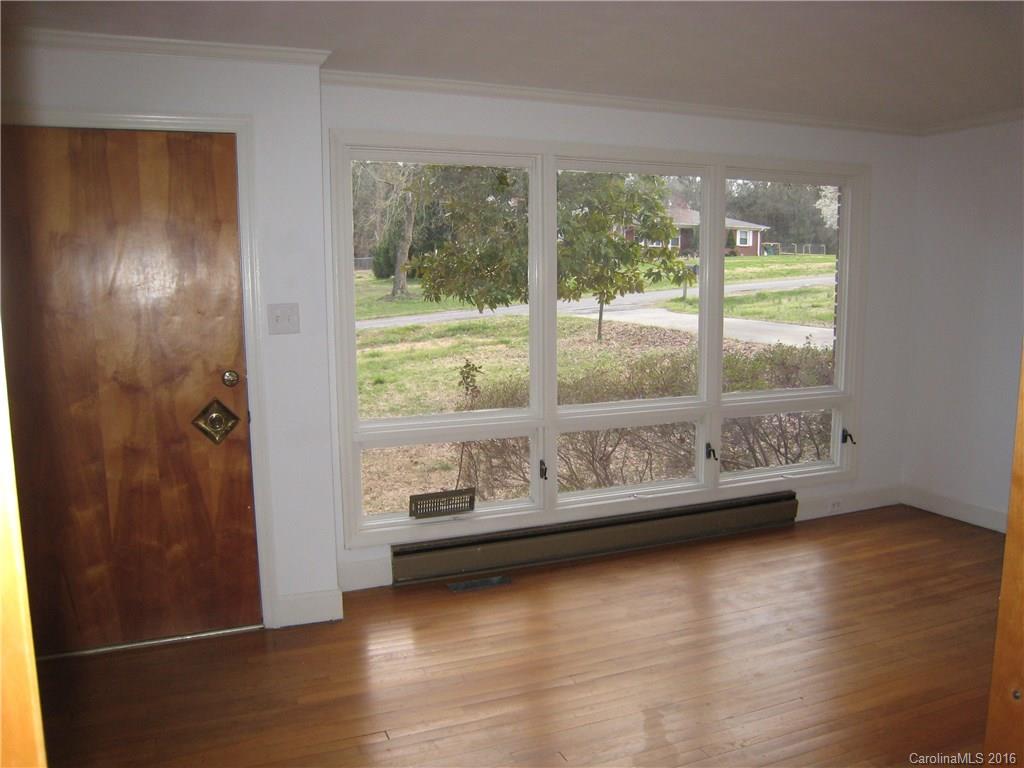 153 State Rd S-29-412 Fort Mill, SC 29707 - Photo 5 of 10 a view of room with window and wooden floor