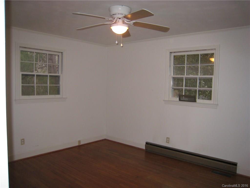 153 State Rd S-29-412 Fort Mill, SC 29707 - Photo 7 of 10 an empty room with a window and ceiling fan