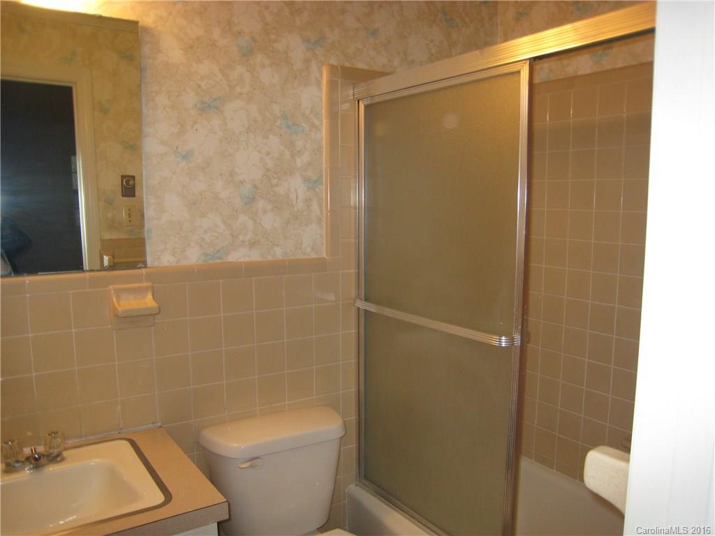 153 State Rd S-29-412 Fort Mill, SC 29707 - Photo 8 of 10 a bathroom with a toilet and shower