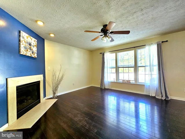 a bathroom with a tub and a sink
