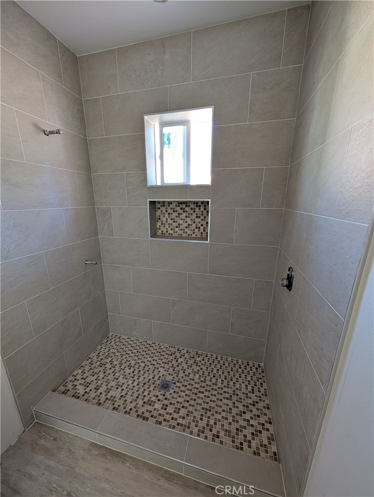 43145 Bob Cat Road Banning, CA 92220 - Photo 28 of 49 a bathroom with a window