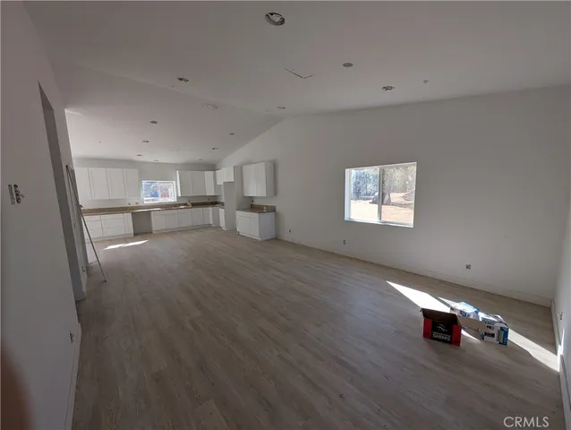 a kitchen with a stove and a sink
