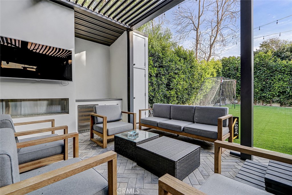 1852 6th Street Manhattan Beach, CA 90266 - Photo 17 of 60 a outdoor living space with furniture and a potted plant