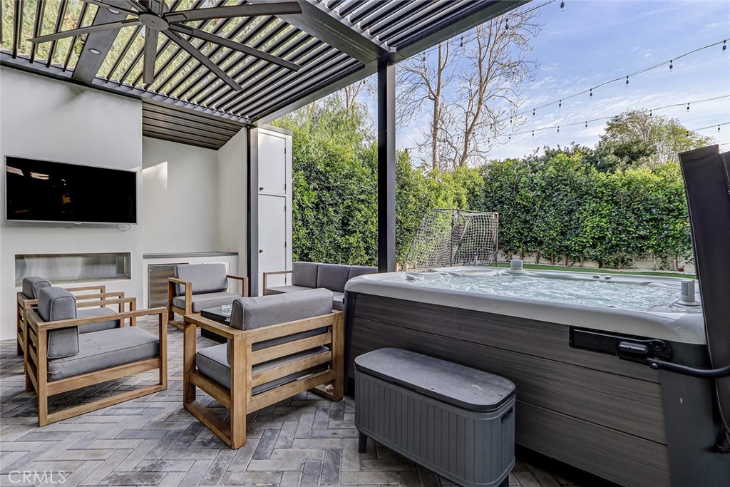 1852 6th Street Manhattan Beach, CA 90266 - Photo 18 of 60 a outdoor living space with furniture and a flat screen tv