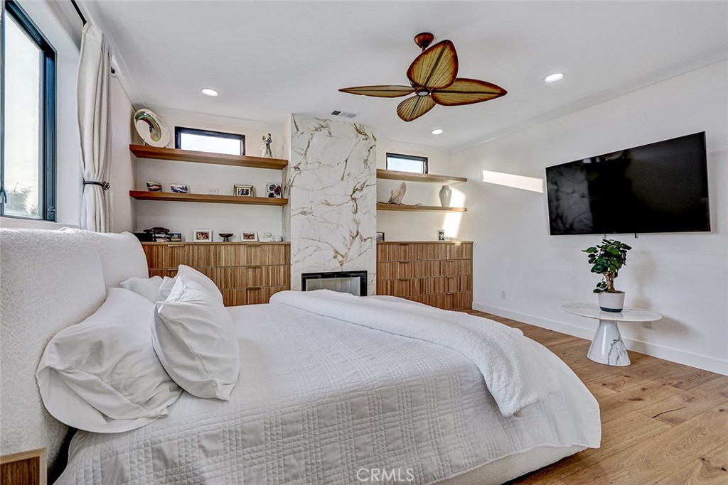 1852 6th Street Manhattan Beach, CA 90266 - Photo 48 of 60 a bedroom with a bed and a flat screen tv