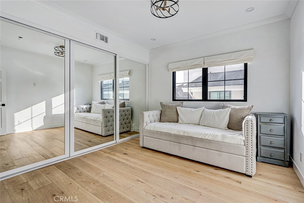1852 6th Street Manhattan Beach, CA 90266 - Photo 52 of 60 a living room with furniture and a large window