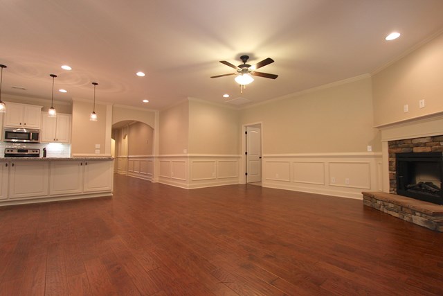 7600 Lynch Road Midland, GA 31820 - Photo 5 of 16 a view of a room with kitchen and a fireplace