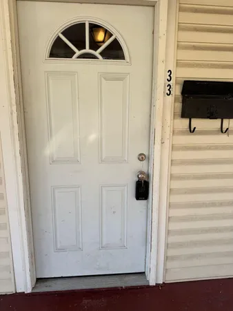 a view of a entryway door of the house