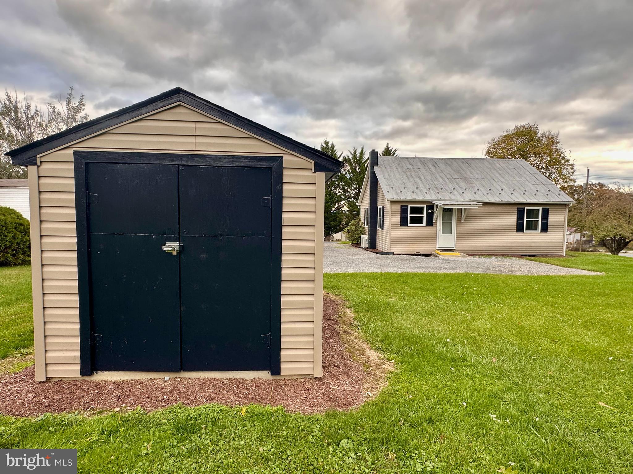 7488 Dusty Road Mercersburg, PA 17236 - Photo 2 of 26 a front view of a house with garden