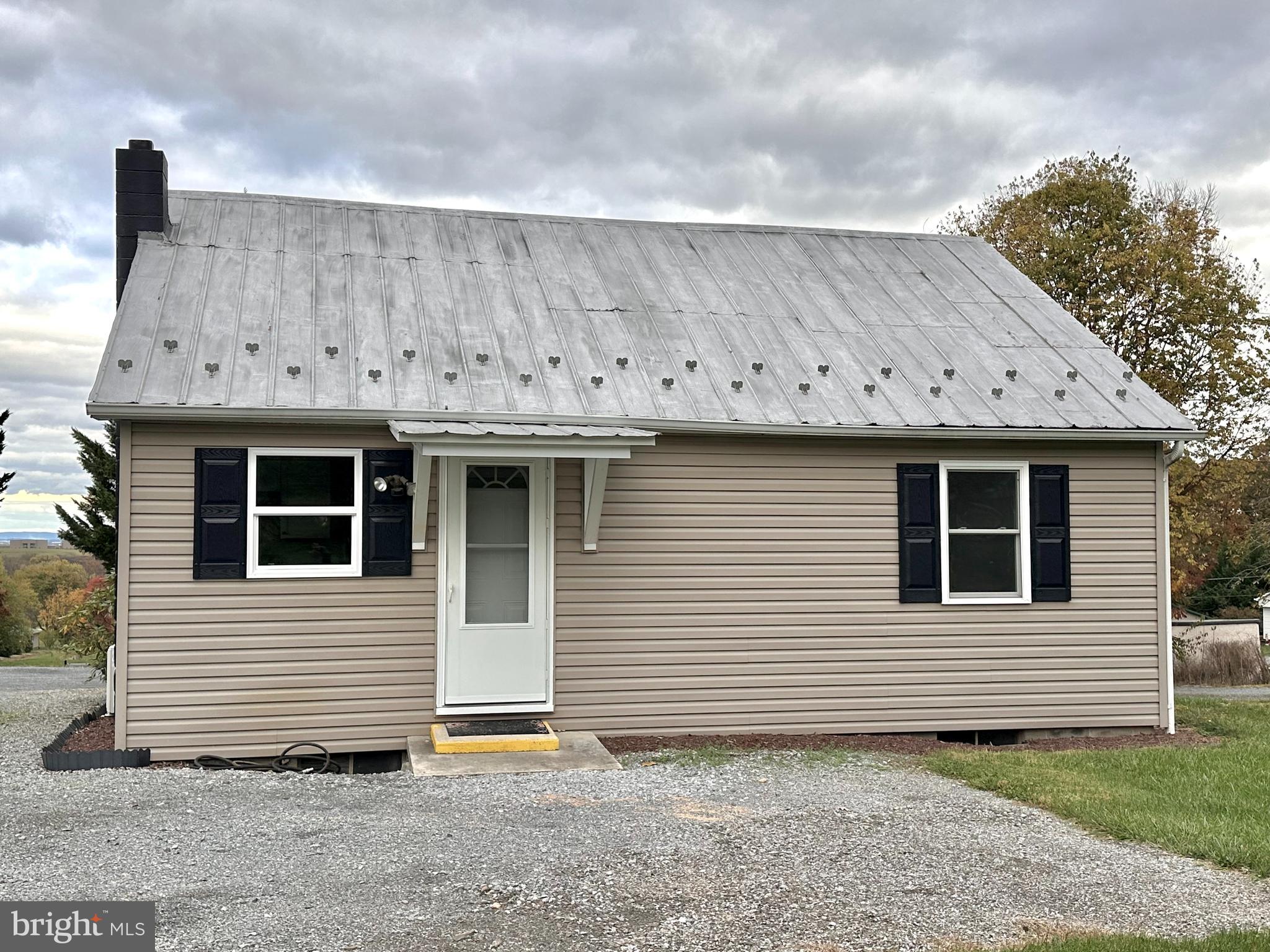 7488 Dusty Road Mercersburg, PA 17236 - Photo 25 of 27 a view of a house with wooden fence