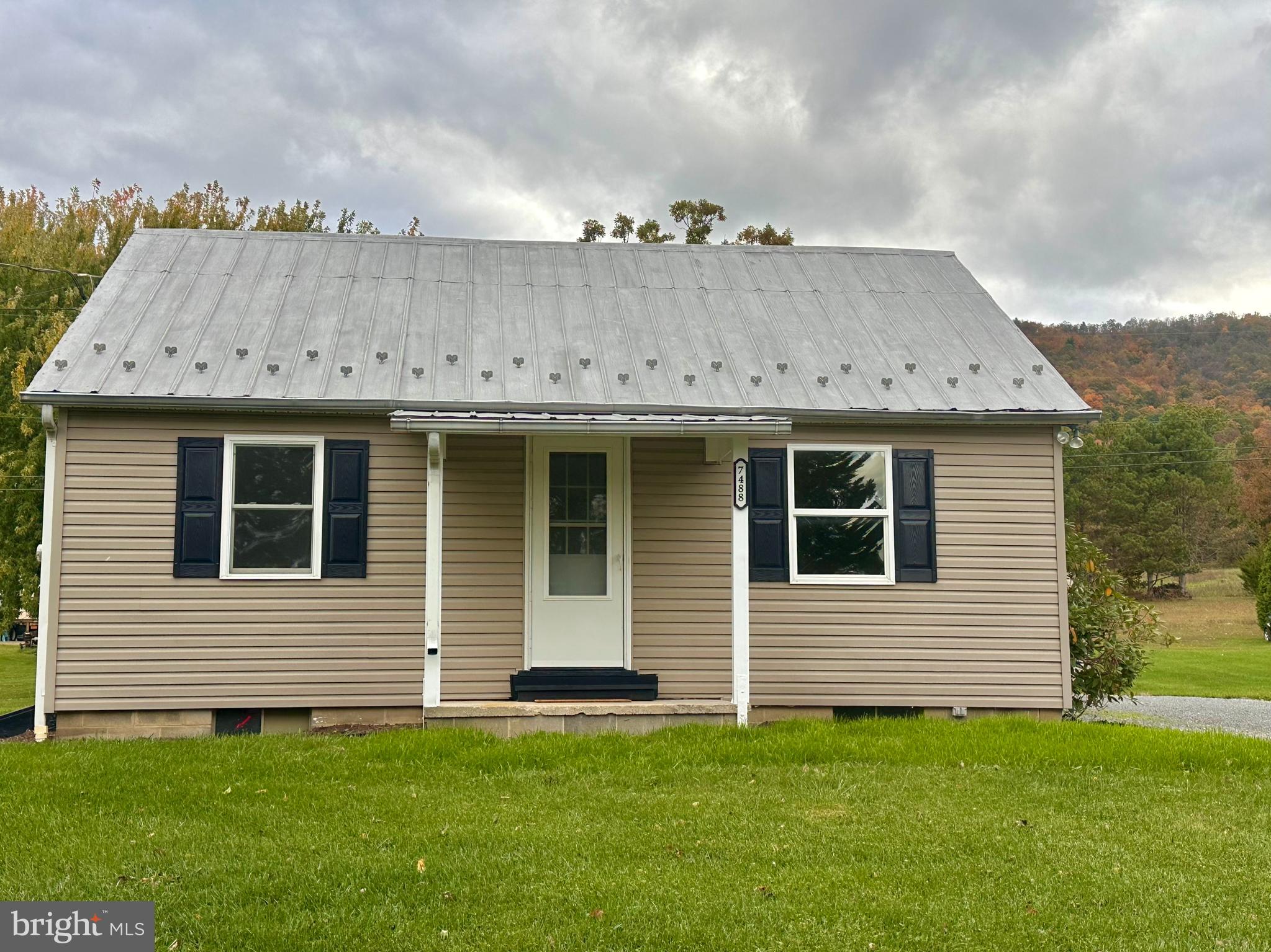 7488 Dusty Road Mercersburg, PA 17236 - Photo 26 of 27 a view of a house with a backyard