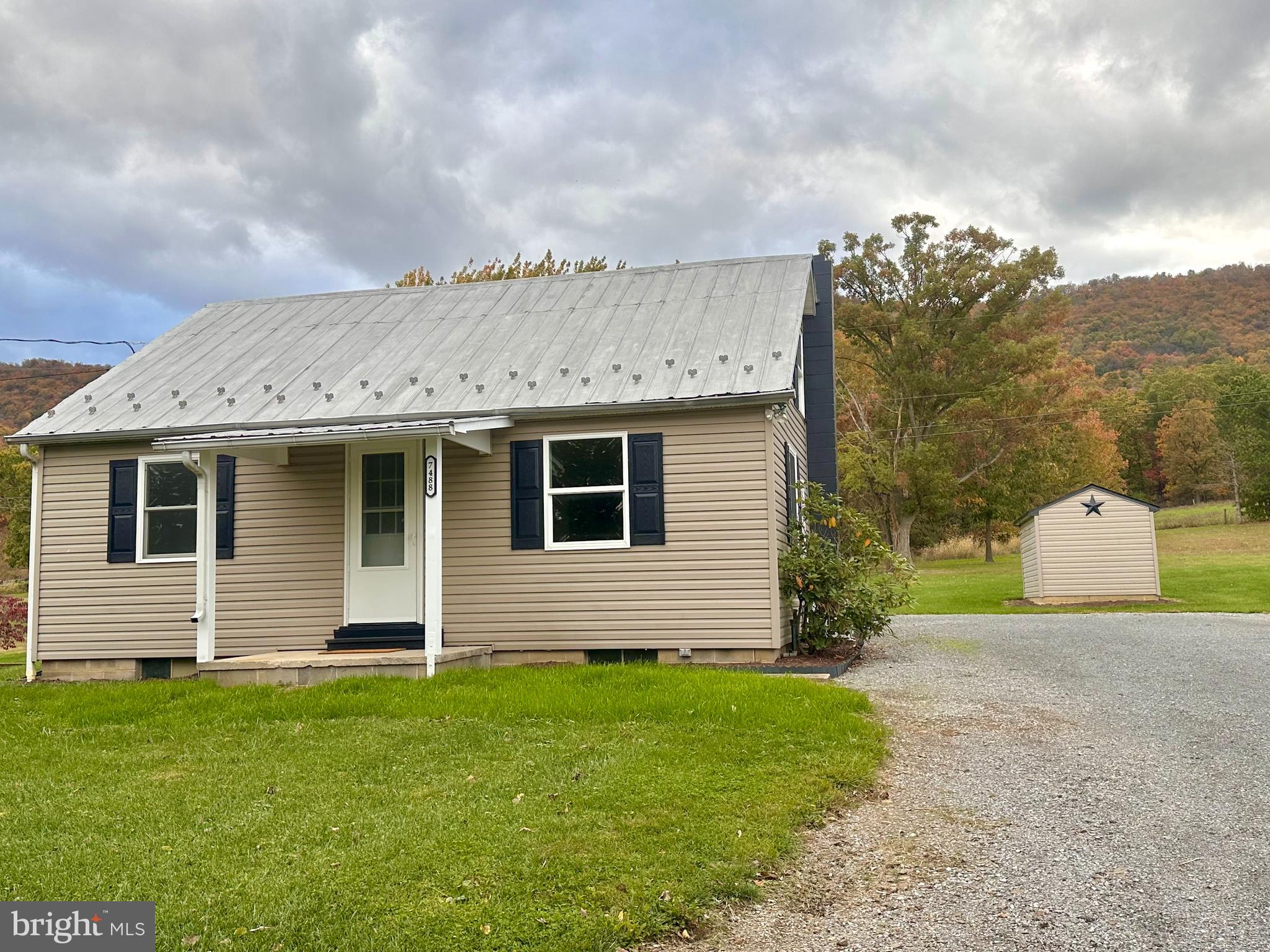 7488 Dusty Road Mercersburg, PA 17236 - Photo 27 of 27 a front view of a house with a garden