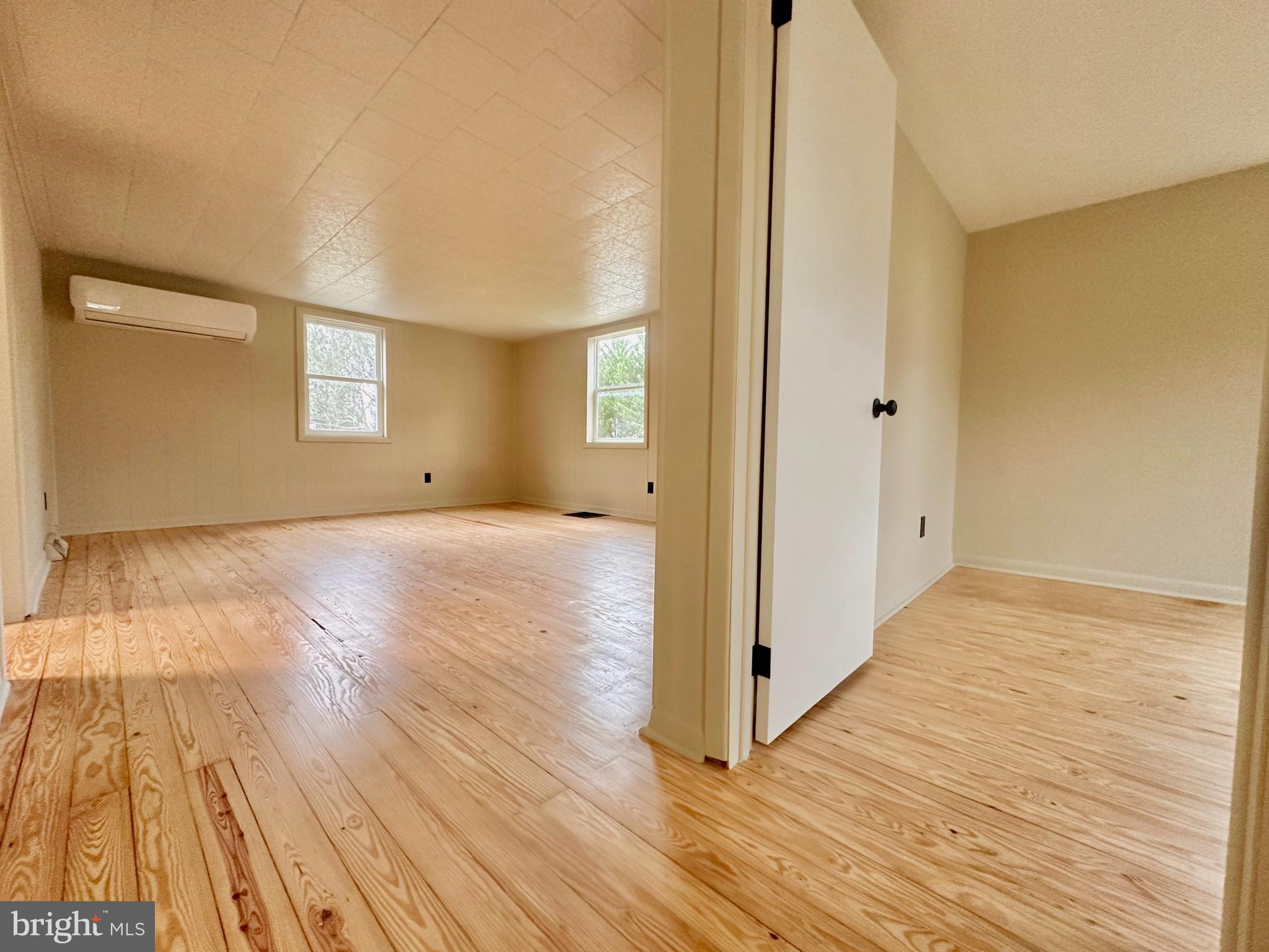7488 Dusty Road Mercersburg, PA 17236 - Photo 10 of 26 a view of an empty room with wooden floor