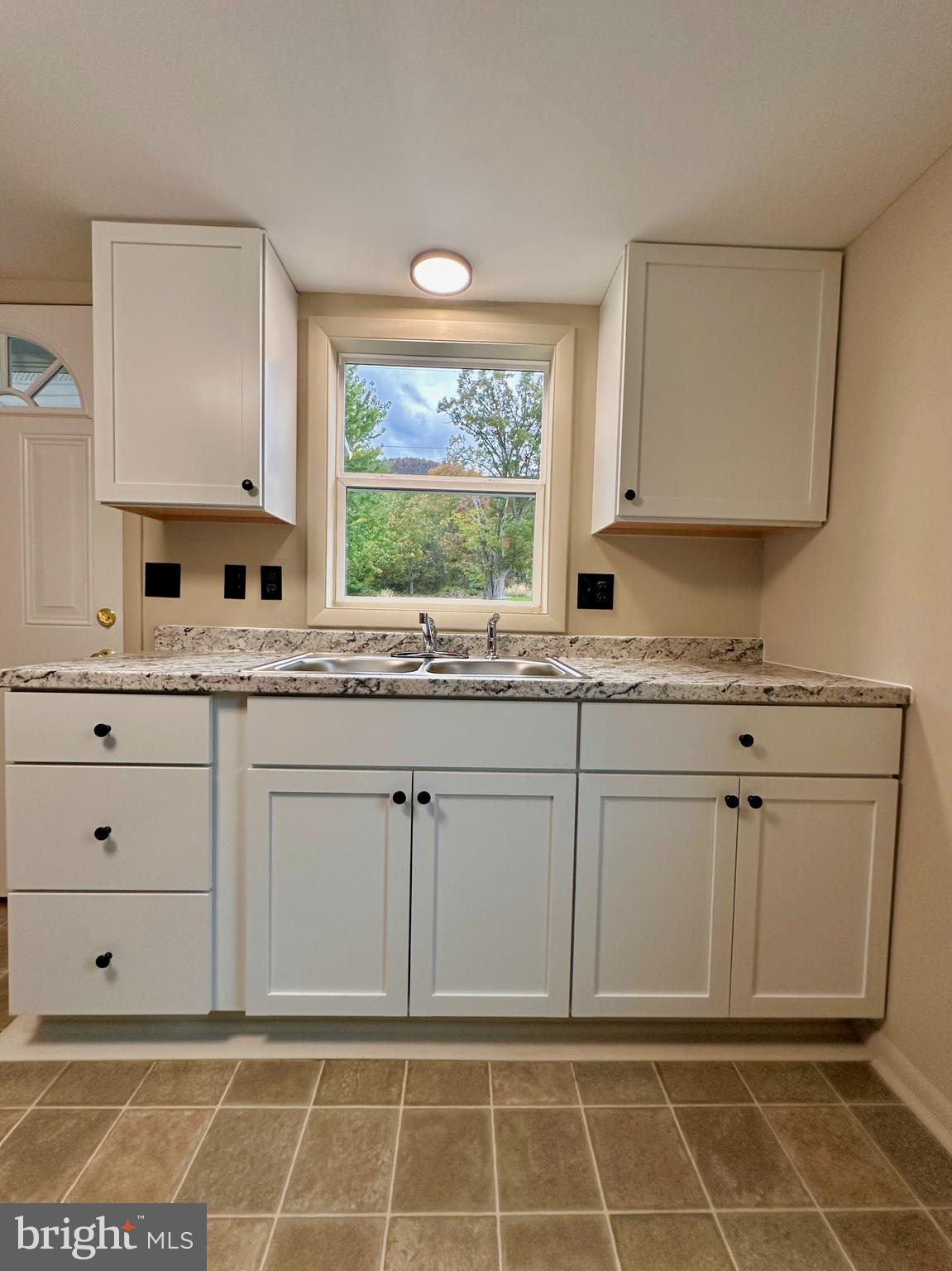 7488 Dusty Road Mercersburg, PA 17236 - Photo 10 of 27 a view of a kitchen with granite countertop cabinets