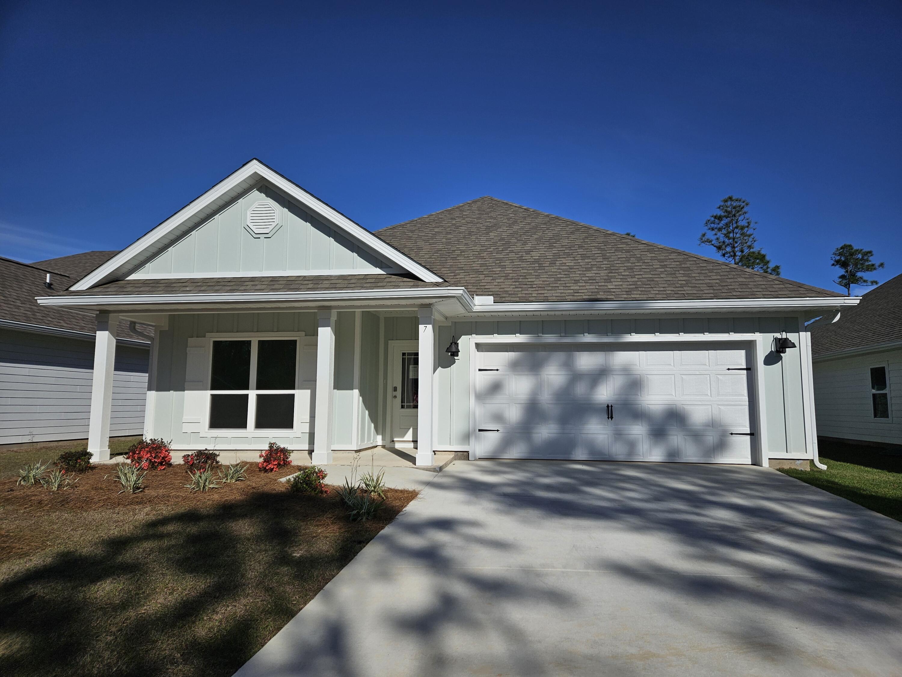 7 Nest Lane Santa Rosa Beach, FL 32459 - Photo 1 of 16 a view of a house with a yard
