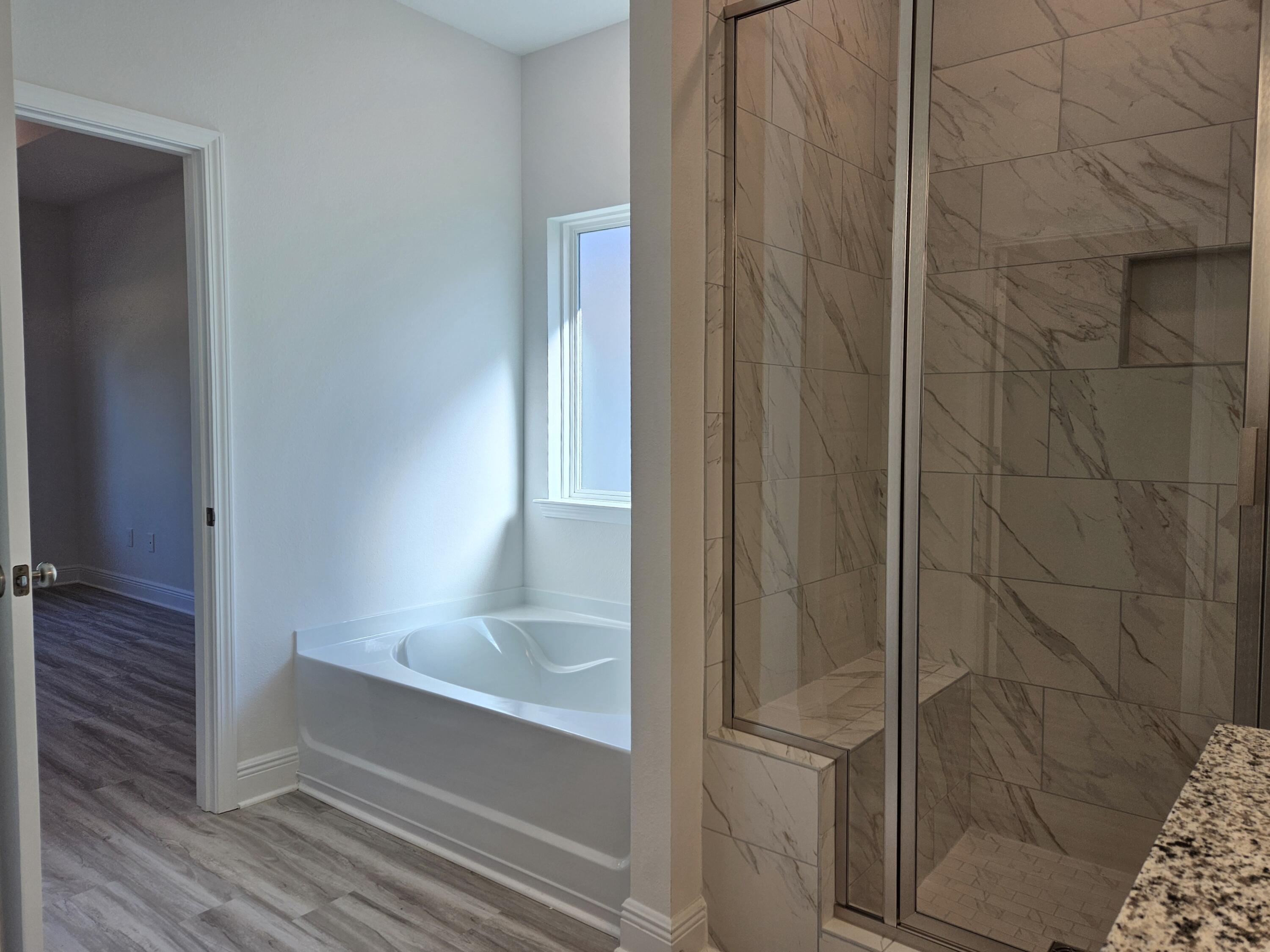 7 Nest Lane Santa Rosa Beach, FL 32459 - Photo 12 of 16 a bathroom with a bathtub
