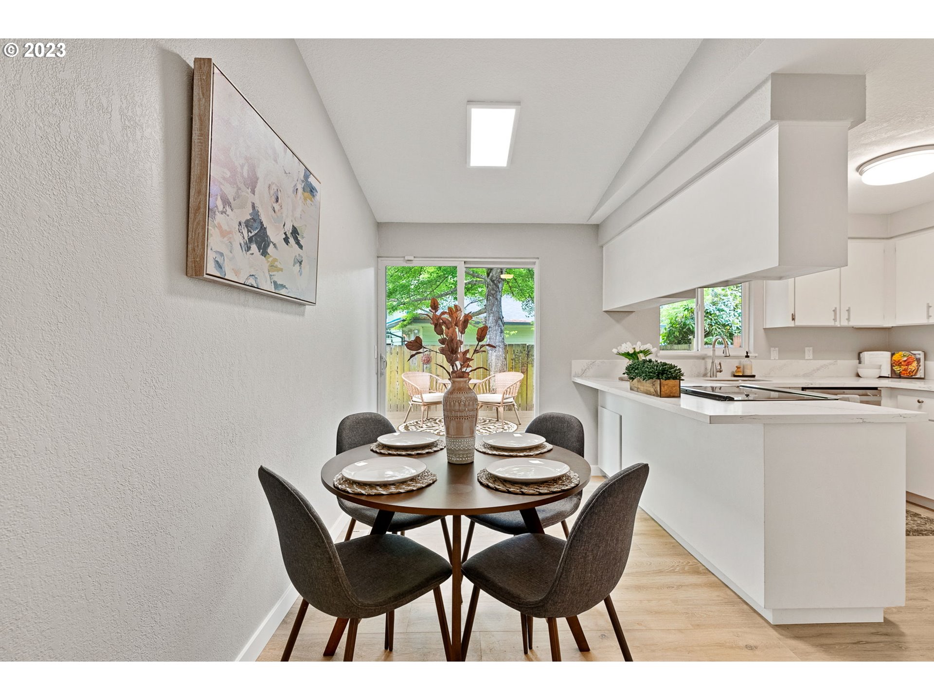 5830 Southwest 177th Avenue Beaverton, OR 97007 - Photo 11 of 41 a dining room with furniture and a large window