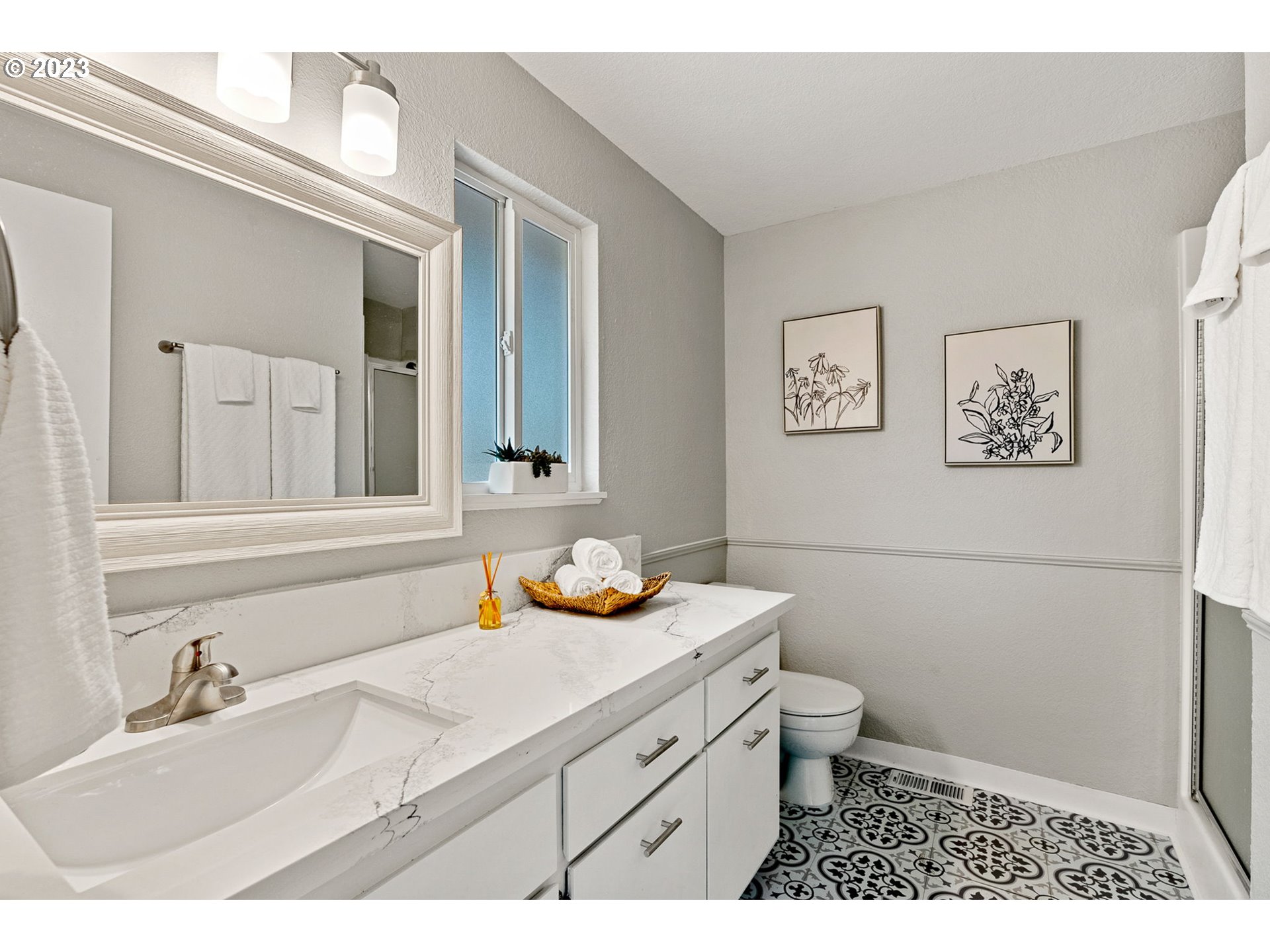 5830 Southwest 177th Avenue Beaverton, OR 97007 - Photo 20 of 41 a bathroom with a sink vanity mirror and toilet