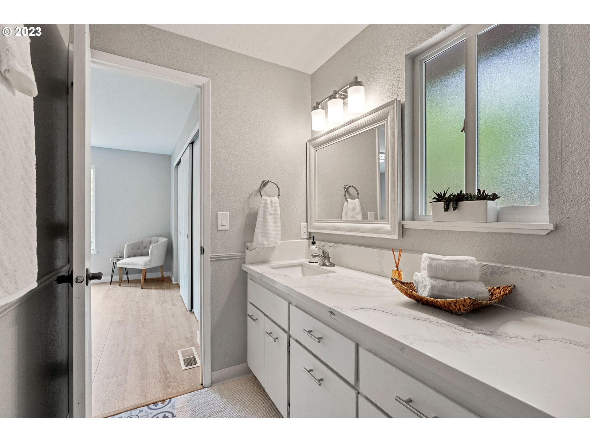 5830 Southwest 177th Avenue Beaverton, OR 97007 - Photo 22 of 41 a bathroom with a sink vanity and mirror
