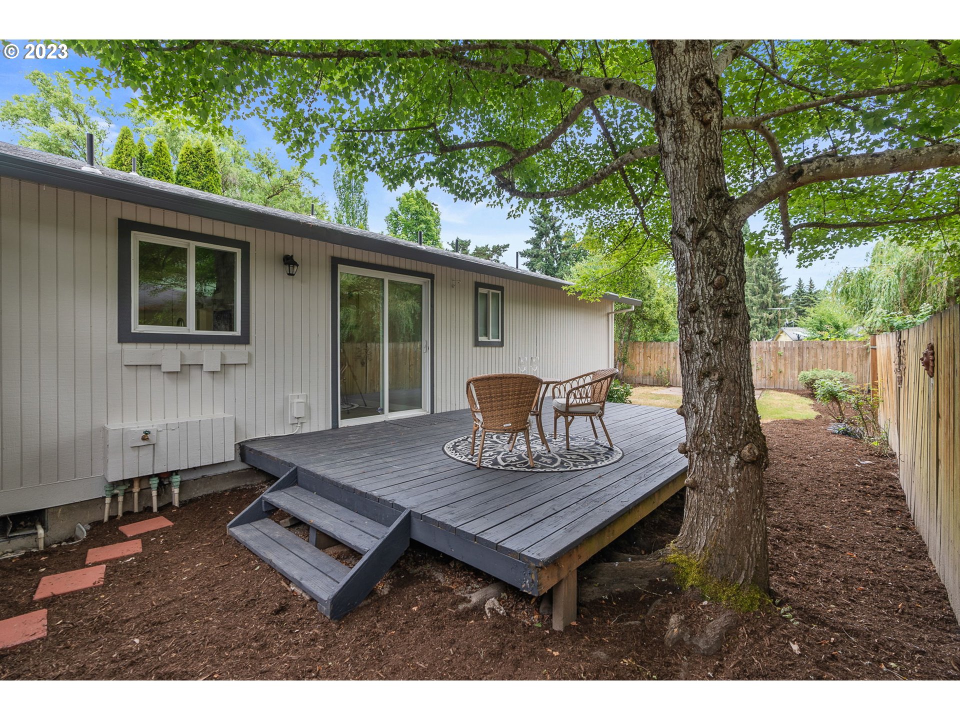 5830 Southwest 177th Avenue Beaverton, OR 97007 - Photo 31 of 41 a house view with a sitting space and garden