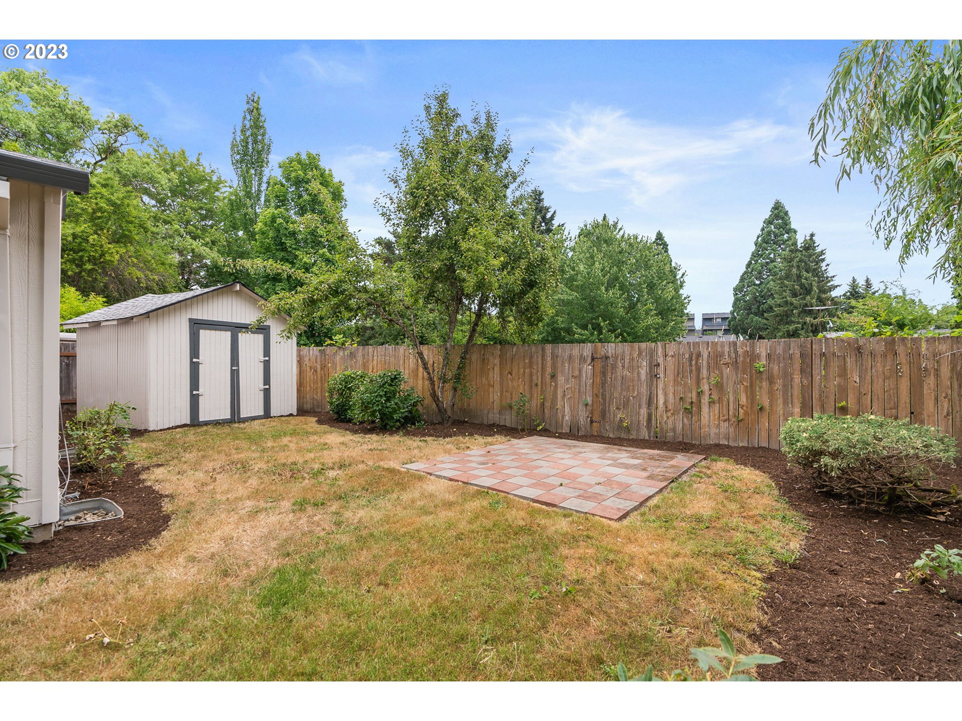 5830 Southwest 177th Avenue Beaverton, OR 97007 - Photo 35 of 41 a backyard of a house with table and chairs