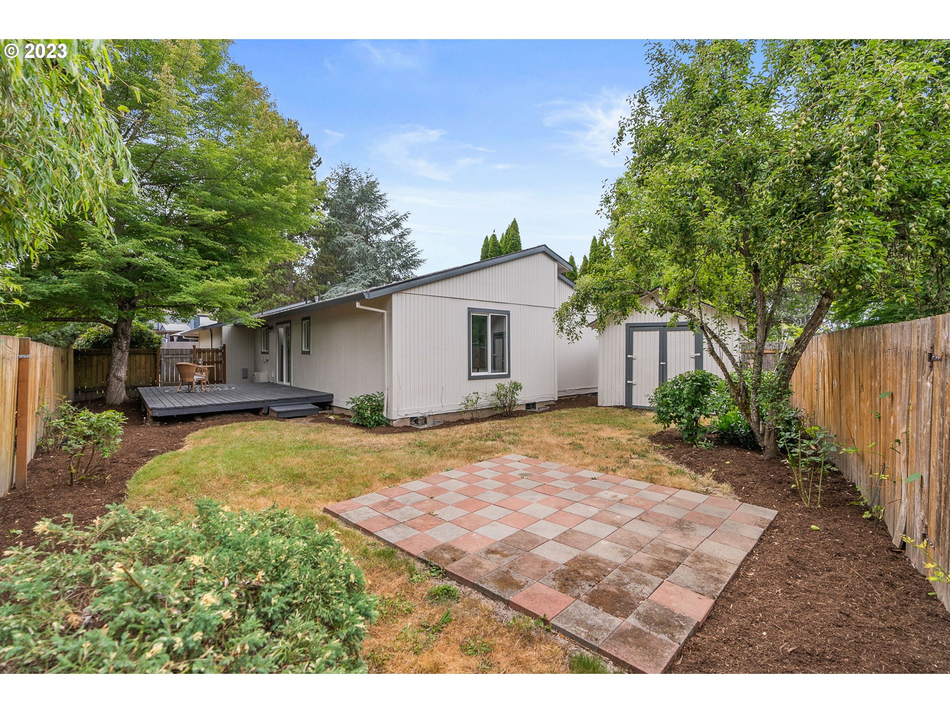 5830 Southwest 177th Avenue Beaverton, OR 97007 - Photo 36 of 41 a view of a house with backyard and tree