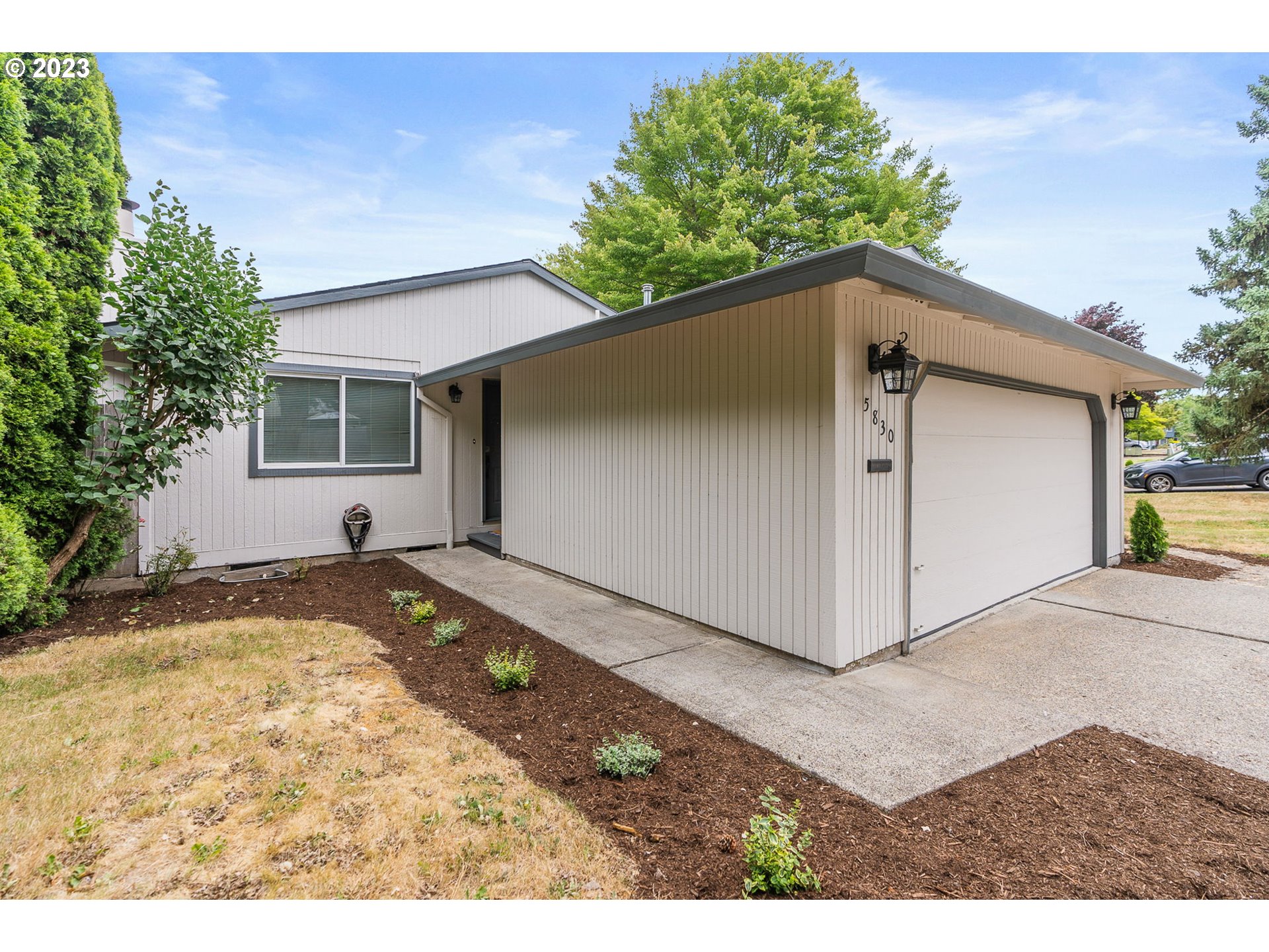 5830 Southwest 177th Avenue Beaverton, OR 97007 - Photo 4 of 41 a view of a house with a backyard