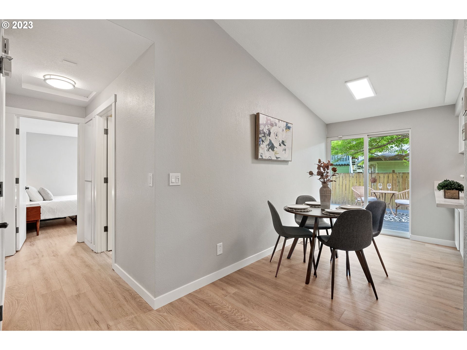 5830 Southwest 177th Avenue Beaverton, OR 97007 - Photo 10 of 41 a view of a dining room with furniture and wooden floor