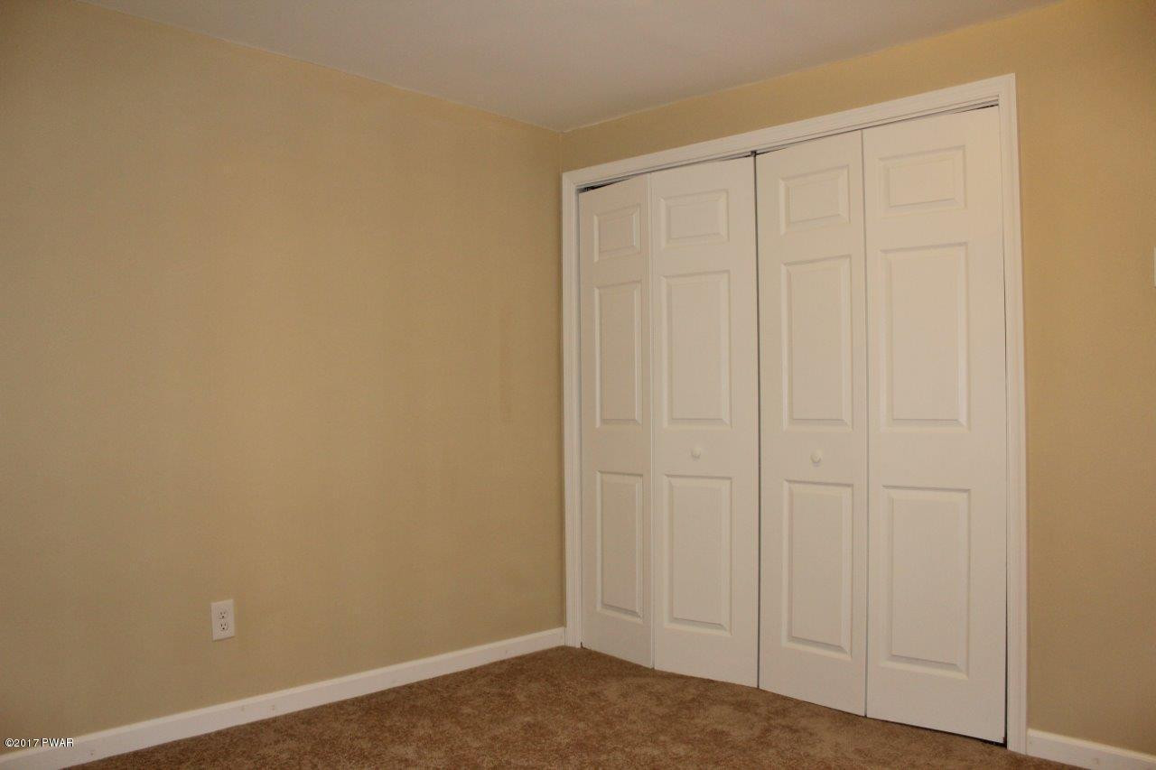130 Stamford Road Dingmans Ferry, PA 18328 - Photo 12 of 25 a view of an empty room