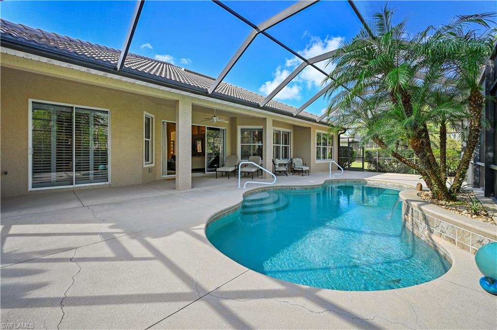 7950 Founders Circle Naples, FL 34104 - Photo 36 of 43 a view of a house with backyard porch and sitting area