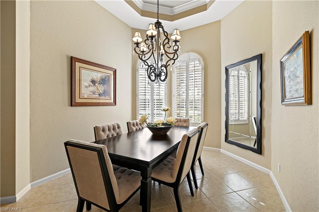 7950 Founders Circle Naples, FL 34104 - Photo 9 of 43 a dining room with furniture and window
