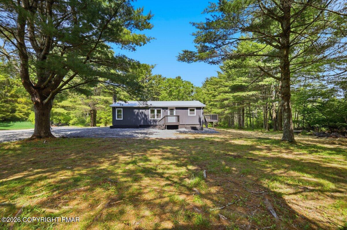 155 Blooming Grove Road Hawley, PA 18428 - Photo 8 of 41 a view of a house with a yard