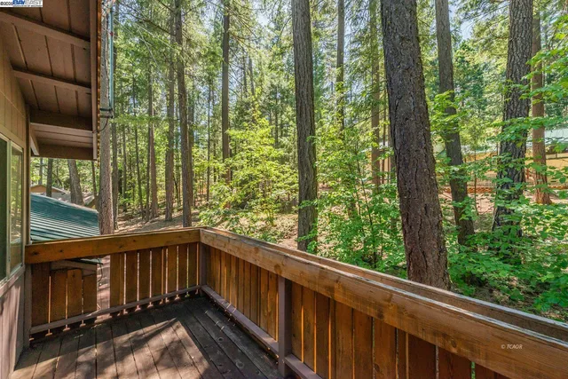 a view of a balcony with an outdoor space