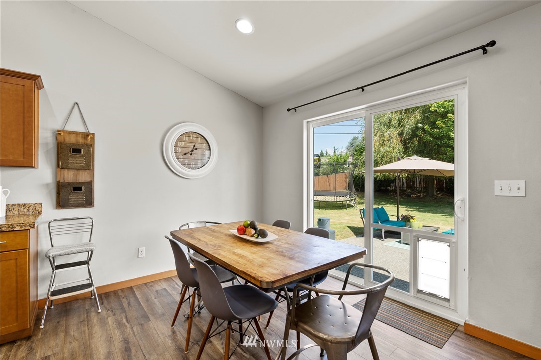 20815 9th Drive Southeast Bothell, WA 98021 - Photo 11 of 23 a view of a dining room with furniture window and outside view