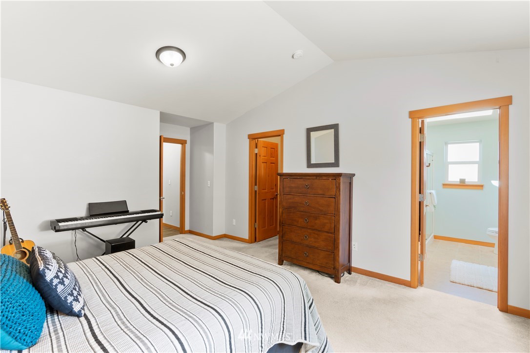 20815 9th Drive Southeast Bothell, WA 98021 - Photo 13 of 23 a bedroom with a bed and wooden floor