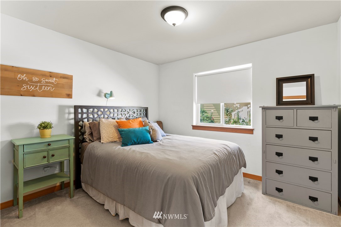 20815 9th Drive Southeast Bothell, WA 98021 - Photo 16 of 23 a bedroom with a bed and a window